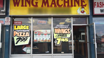 Gino's Pizza Wing Machine outside