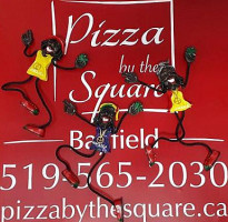 Pizza By The Square logo